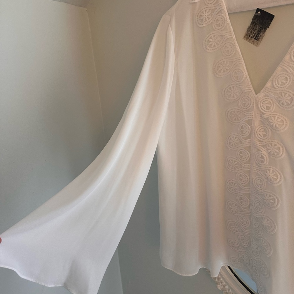 Elegant White Blouse with Embroidered Details